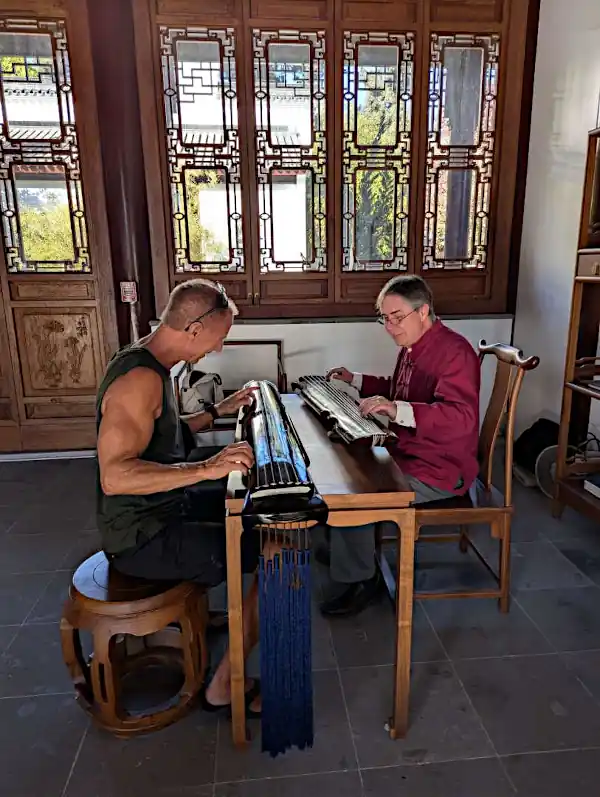 Mark teaching visitors Guqin in the Scholars Pavilion at the Huntington Library’s Chinese Garden, San Marino, California.